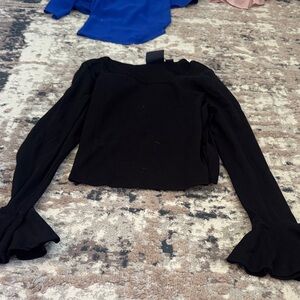 Women’s black ruffled sleeved top